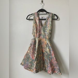 Brand new Alice & Olivia party dress with original tag size 0. Multi colored.